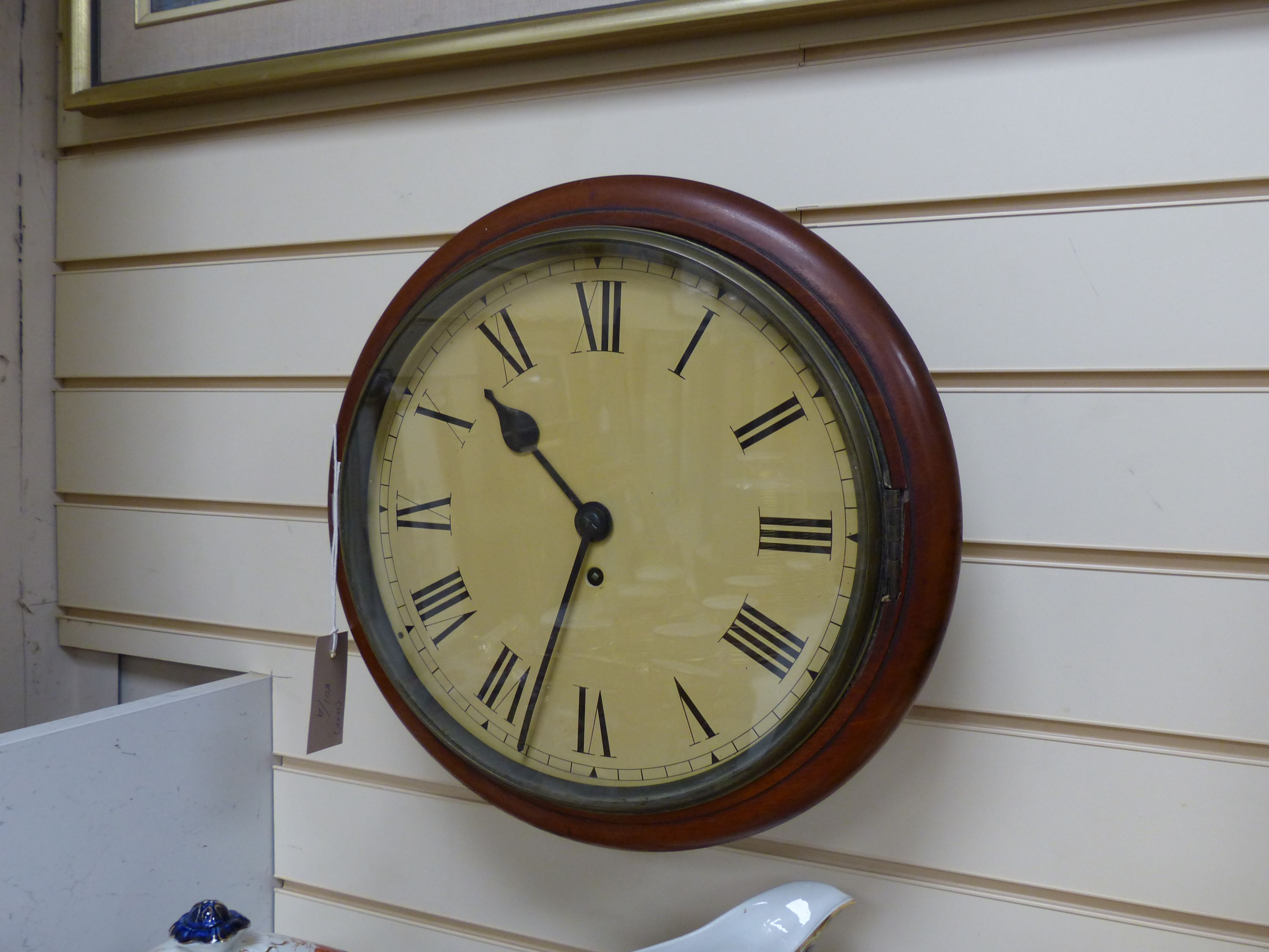A late Victorian mahogany dial clock (key and pendulum), diameter 38cm